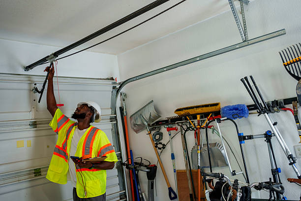 Professional Garage Door Panel Replacement technician working in East Bethel, MN